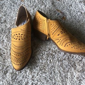 Mustard yellow ankle booties.
